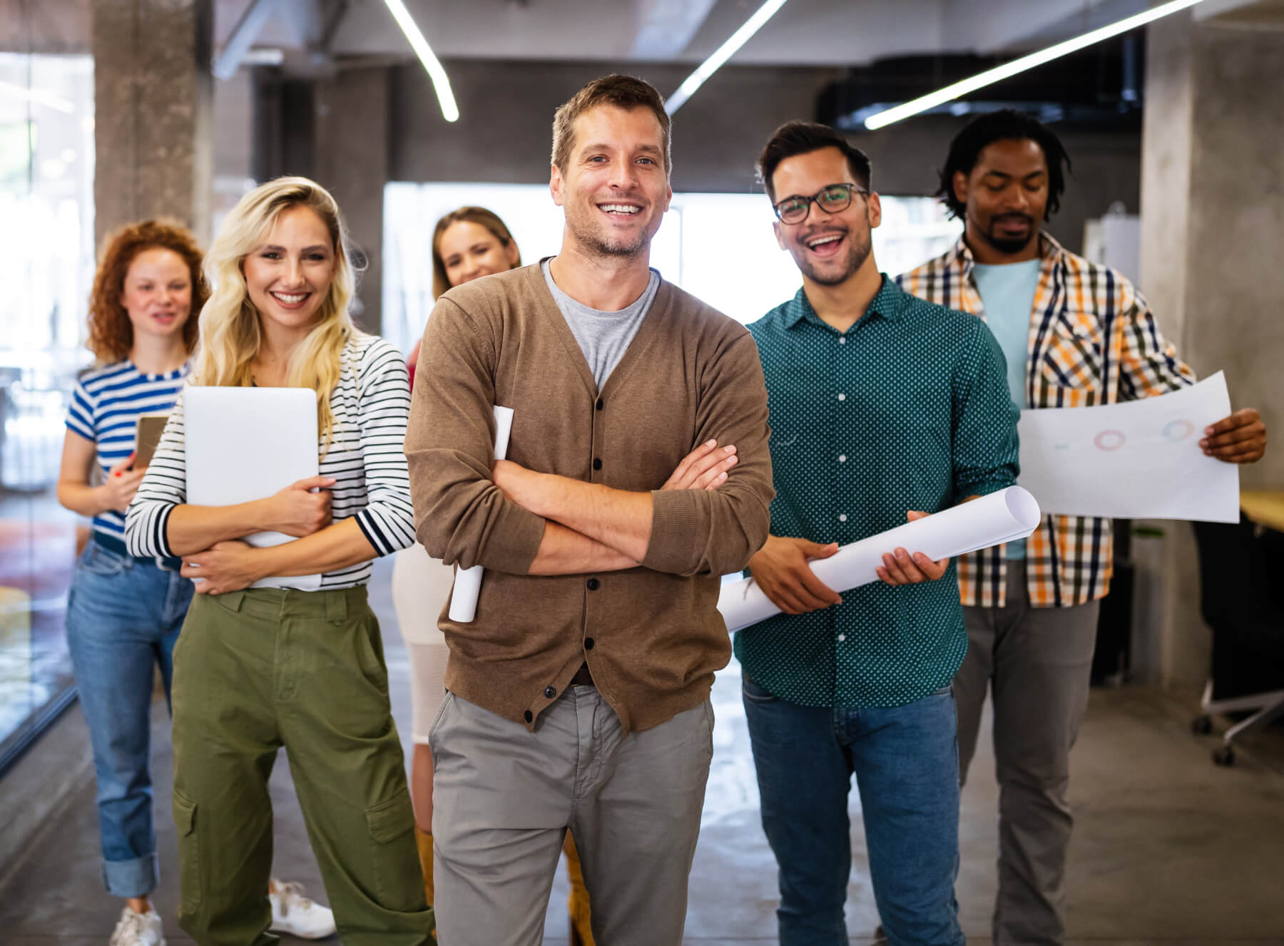 a group of people holding a piece of paper