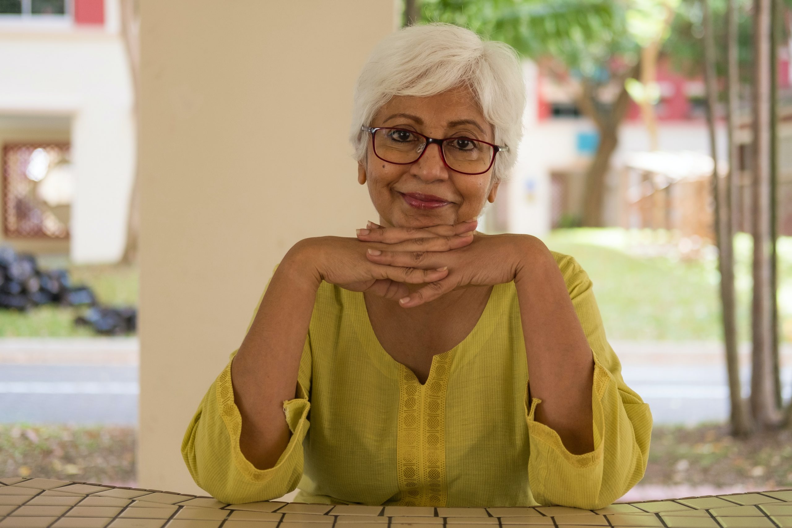 a woman sitting on a bench